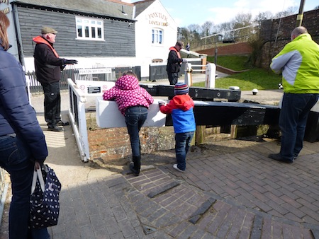 Children helping with a lock